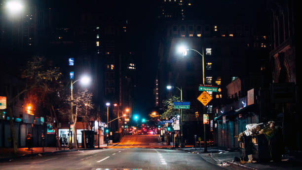 Colour photo of traffic lights in an empty street and road