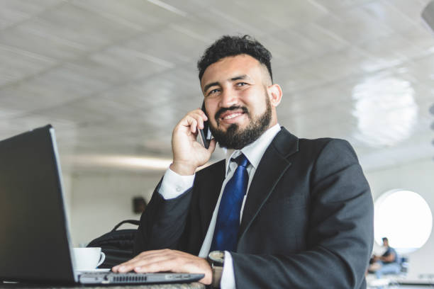 istock Businessman working online from a coffee shop 1194171511