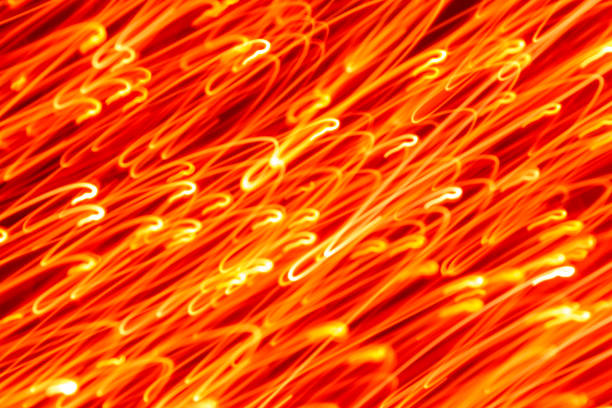 istock Futuristic blurred lights holiday monochrome background in bright orange 1194177177