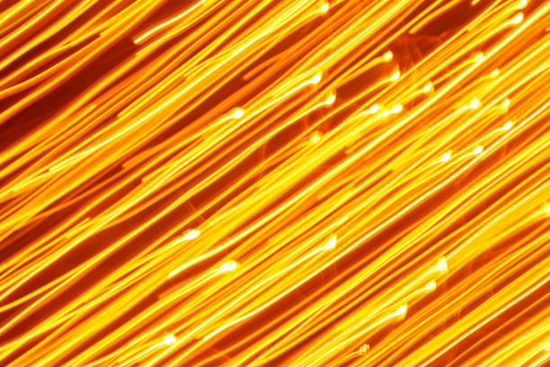 istock Futuristic blurred lights holiday monochrome background in yellow 1194177180