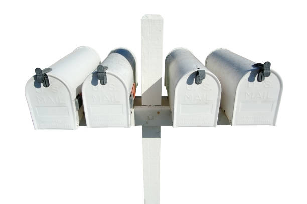 istock Row of White Mailboxes Isolated on a White Background 1194177309