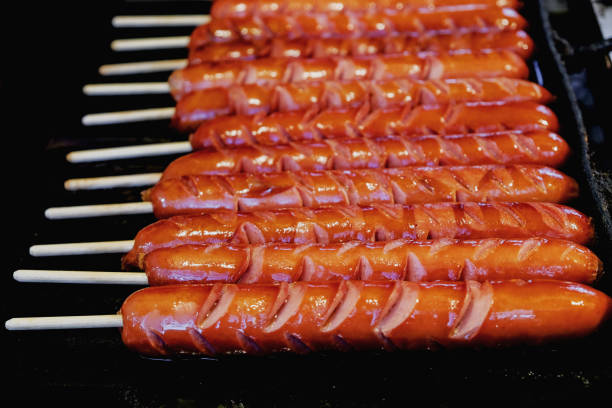 istock Roasting sausages for party 1194177333