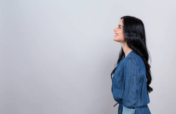 istock Young woman profile shot 1194177562