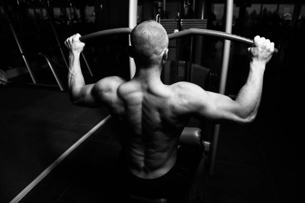 istock Muscular Man Doing Heavy Weight Exercise For Back 1194178297