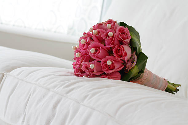 Beautiful white and pink aster and chrysanthemums bouquet -colorful fresh flowers arrangement with pink pearl beads.