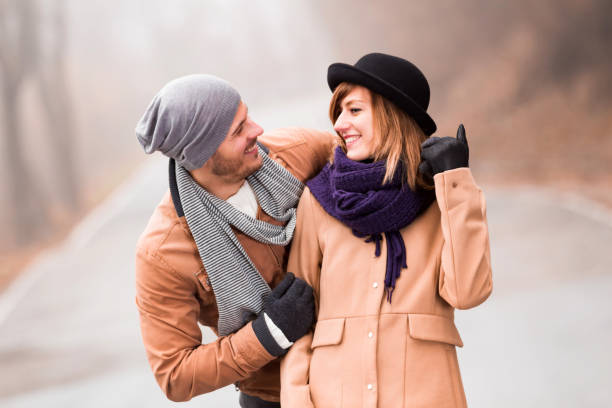 istock Couple enjoying outdoors in cold autumn / winter time. 1194180448