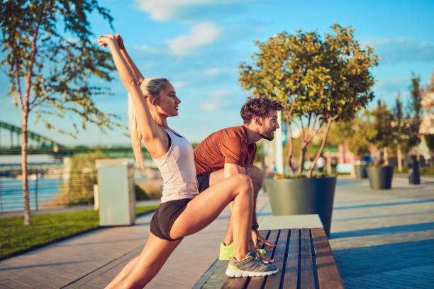 istock Modern couple doing exercise in urban area. 1194181375