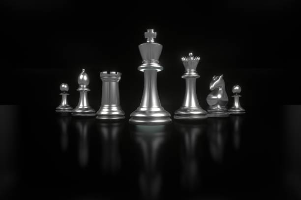 istock Set of chess checkmate concept .3D rendering illustration of silver metallic chess figures with major and minor pieces isolated on black background . High resolution 3D render image 1194184745