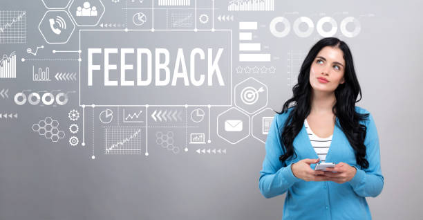 istock Feedback concept with woman holding a smartphone 1194185020