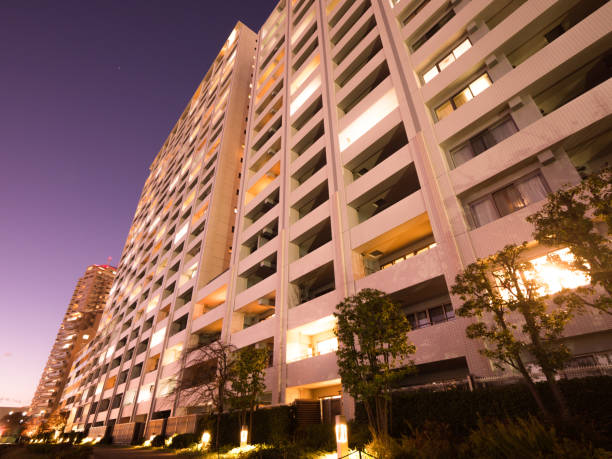 istock High-rise apartment building at sunset 1194185158