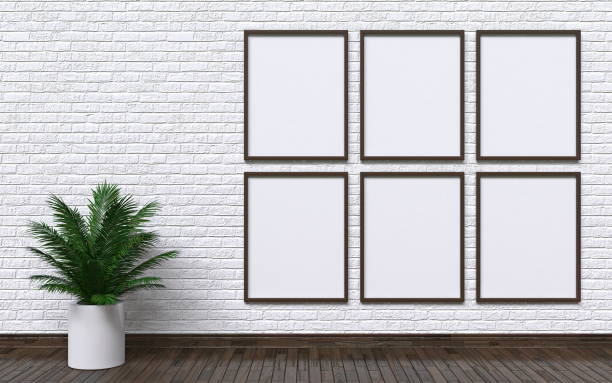 istock Mock up photo frames with plant and wall 3D 1194185217