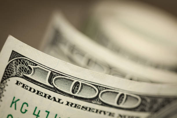 istock Abstract of One Hundred Dollar Bills 1194186108