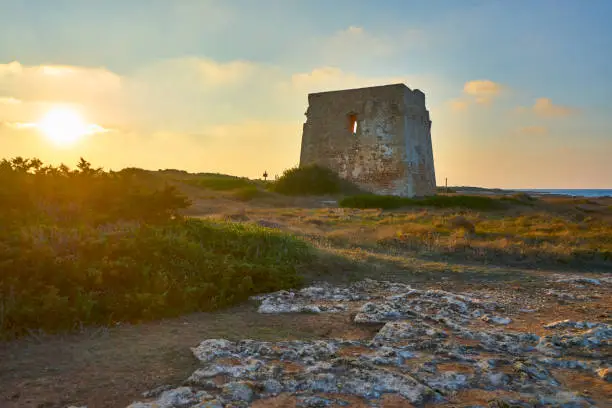 Ruins of Torre Pozzelle An Antique Coastal Watchtower In a Colourful Sunset Ostuni Puglia Italy.