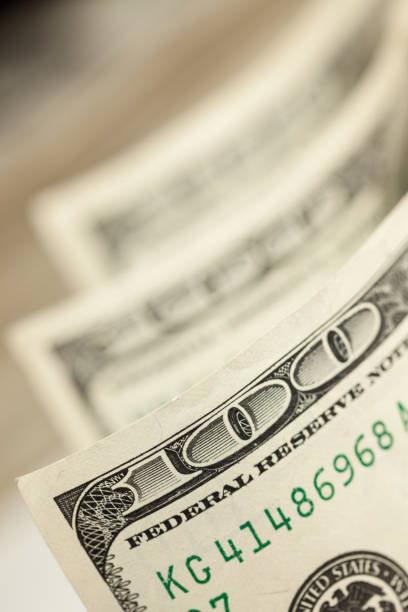 istock Abstract of One Hundred Dollar Bills 1194186304