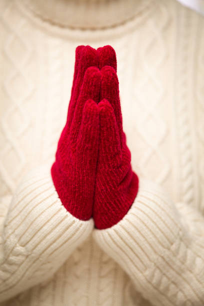hands with woolen gloves isolated on white background