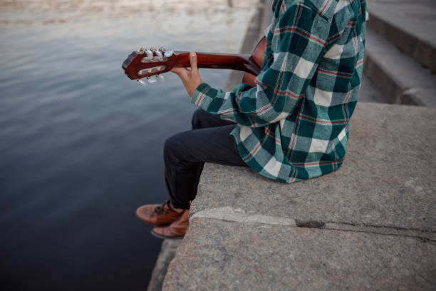istock Young musician is resting while playing outdoors 1194190671