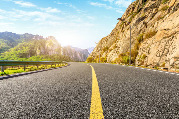 istock Asphalt road and mountain with beautiful clouds landscape. 1194192791