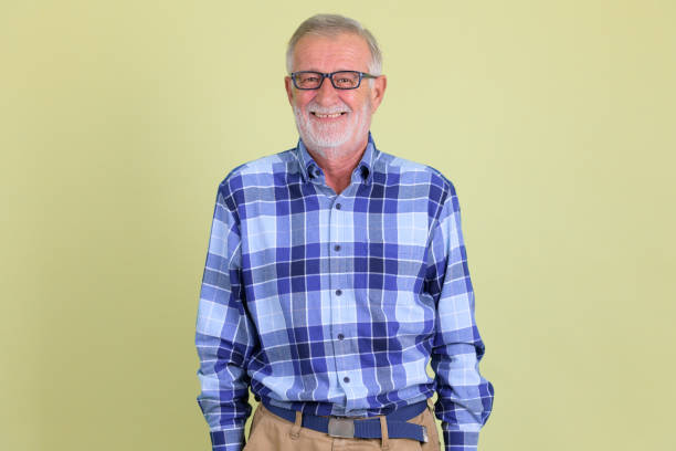 istock Happy senior bearded hipster man with eyeglasses smiling 1194195711