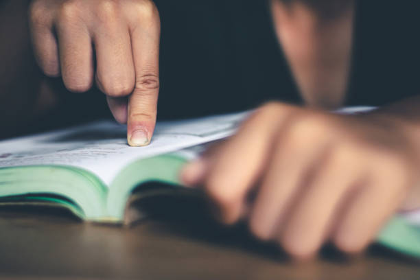 istock The boy was reading a book in a quiet room, Concept read a book. 1194195724