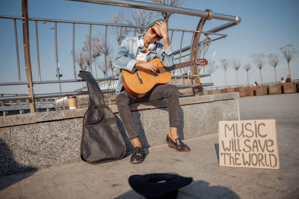 istock Young musician holding head in his hand 1194195838
