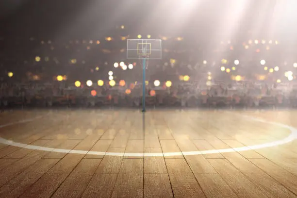 Photo of Basketball court with wooden floor and tribune