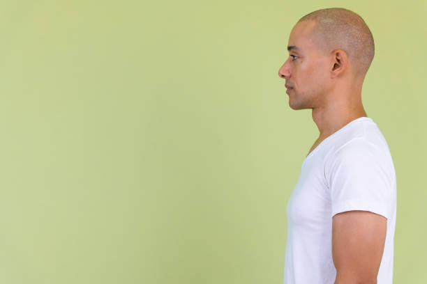istock Profile view of handsome bald man with mixed race 1194197323