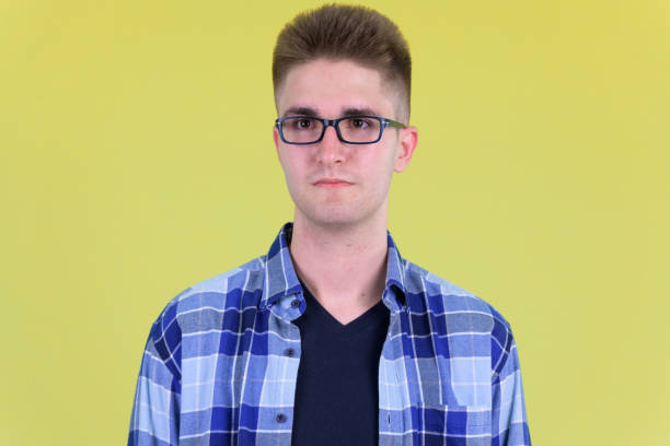 istock Face of young handsome hipster man thinking 1194198311