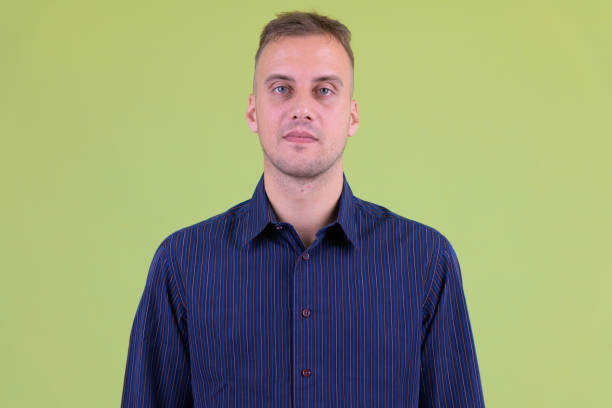 istock Face of handsome businessman looking at camera 1194201584