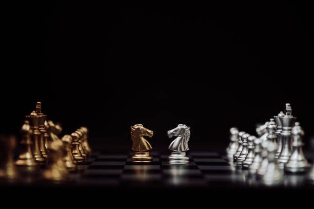 istock Business competition and strategy plan concept. Chess board game gold and silver colour 1194209462