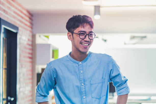 istock portrait of creative designer smile at office 1194211286
