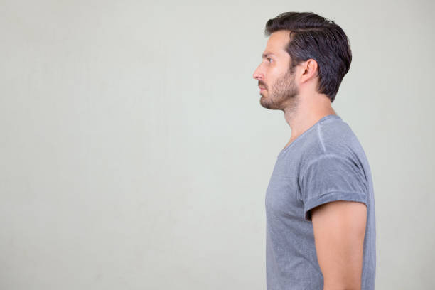 istock Studio shot profile view of handsome bearded man 1194212232