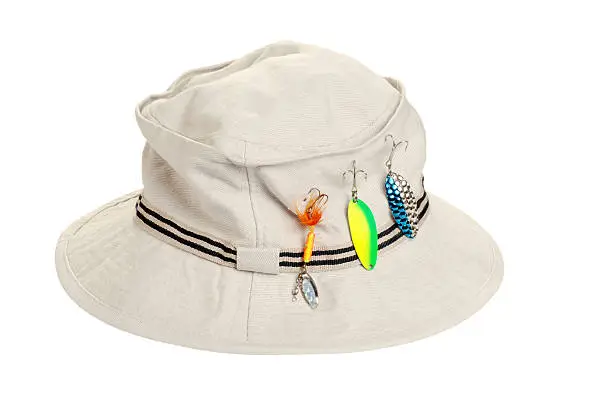 Photo of khaki hat with fishing tackle