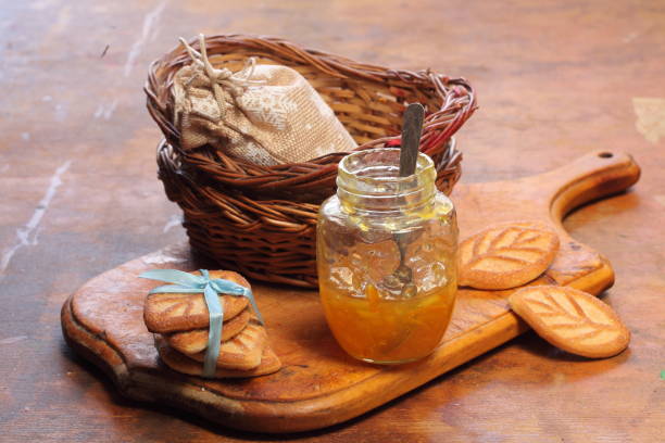 istock Tangerine jam on  wooden background 1194216348