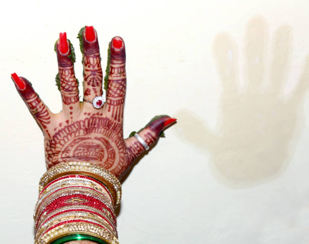istock Indian bride hand print to cloth ritual ceremony 1194217968