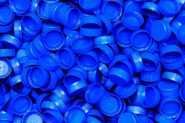istock Background of new blue carved plastic caps 1194218748
