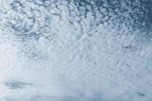 istock Sky with feathery clouds in classic blue 1194219026