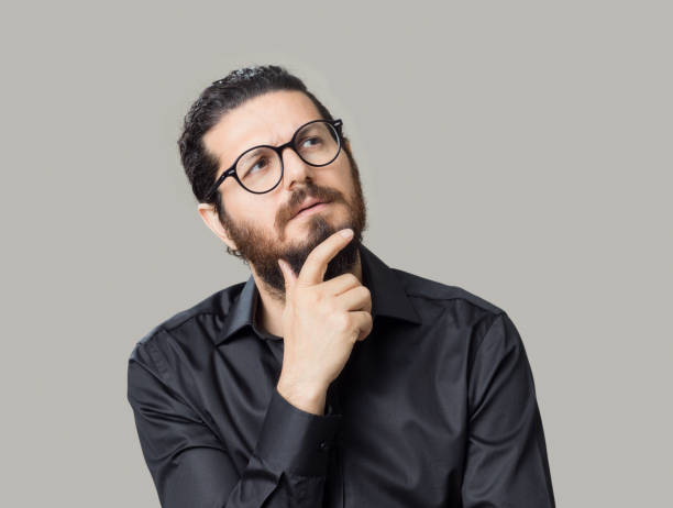 istock Thoughtful young man, close up 1194219895