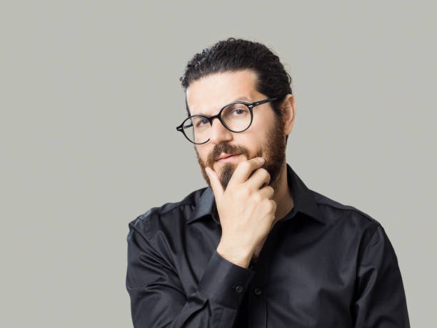 istock Thoughtful young man, close up 1194219958
