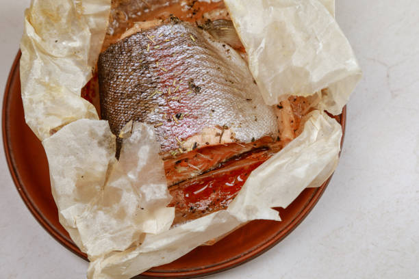 istock juicy appetizing baked salmon with herbs 1194221961