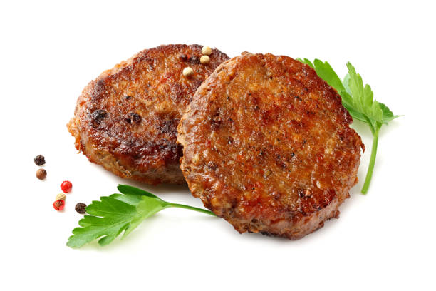 istock grilled burger meat with spices isolated on white background 1194222266