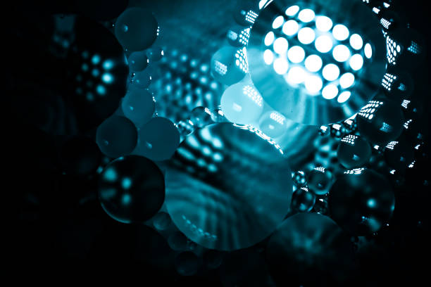 istock Creative abstraction background from circles of different sizes with backlight and gradient. 1194223289