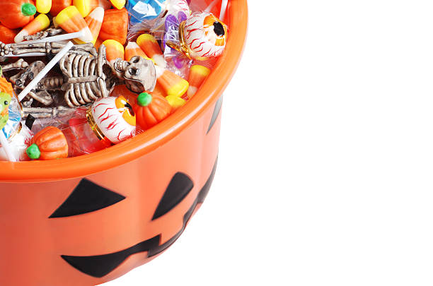 istock top view halloween pumpkin pail with candy 119422816
