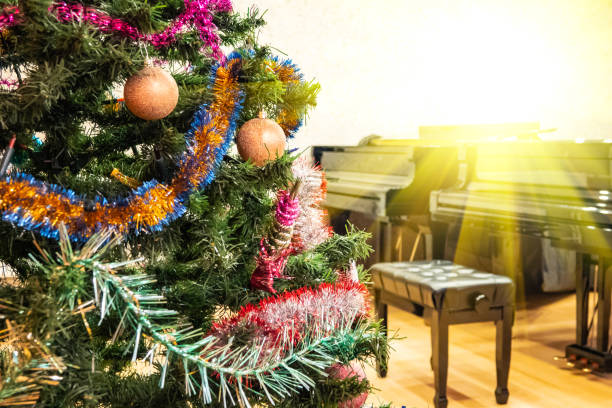 istock Evening christmas with christas tree near piano 1194228779