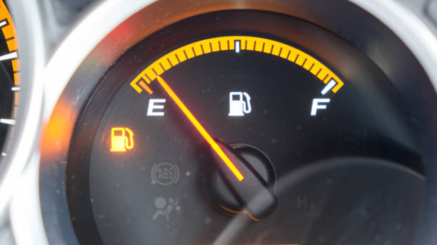 Close up low fuel guage shown in a car