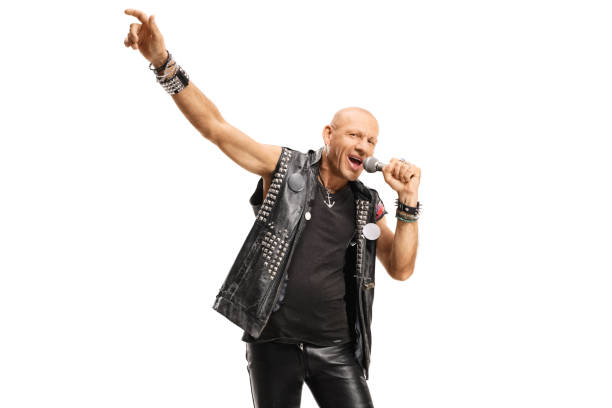 istock Bald rock star male singer singing on a microphone 1194234484