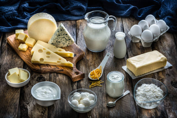 istock Assortment of dairy products on rustic wooden table 1194234583