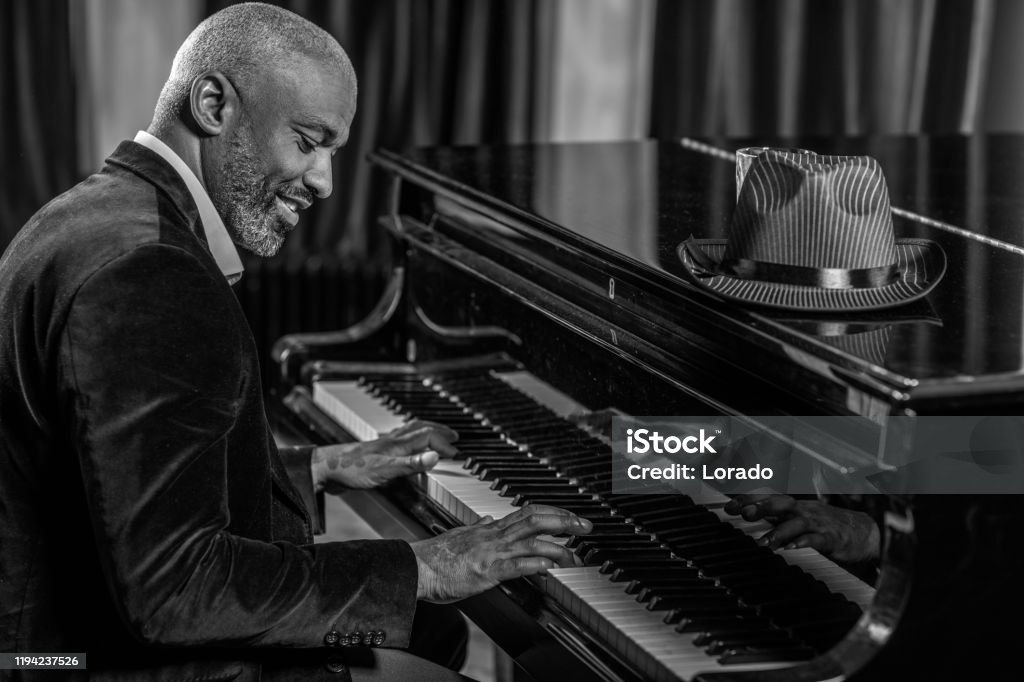Black Piano Playing Man Stock Photo - Download Image Now - 1920-1929