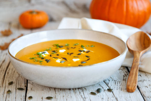 istock Pumpkin soup on white plate 1194238439