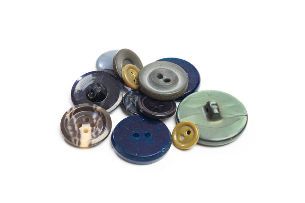 istock Buttons for clothes on white background using for concept of Button Day. 1194239964