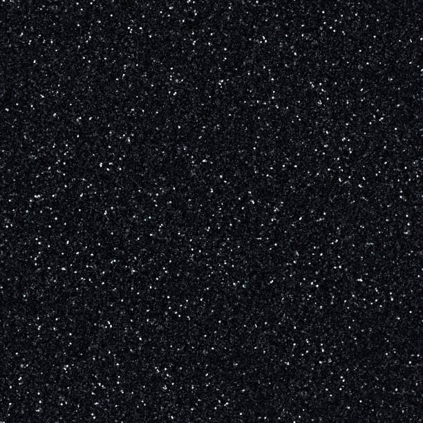 istock Elegant black glitter, sparkle confetti texture. Christmas abstract background, seamless pattern. 1194240564